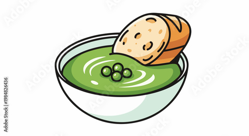 A slice of bread is dipped into a bowl of bright green soup with peas