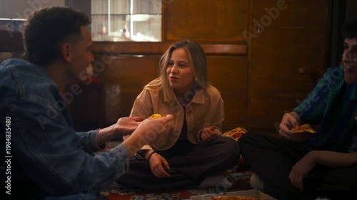 Man Shares Pizza With Woman. Cozy Evening With Playful Pizza Sharing Among Close Friends