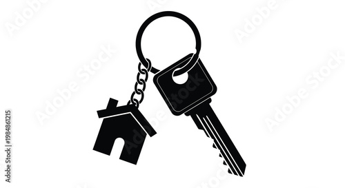 A black silhouette of a house shaped key charm hanging from a key ring