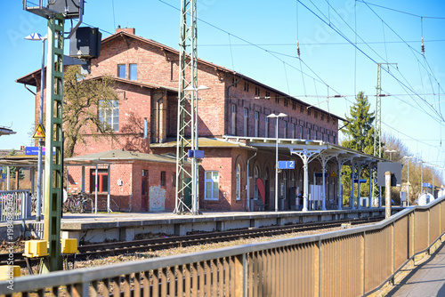 Anklam Train Station, a red brick building, viewed from the tracks on a sunny day, Western Pommerania, Germany, travel concept