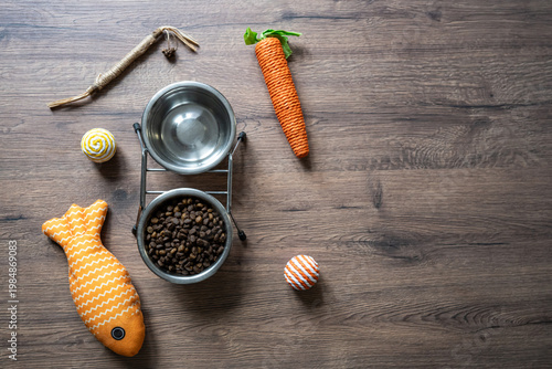 Cat food and toys flat lay with copy space pet care ecommerce concept