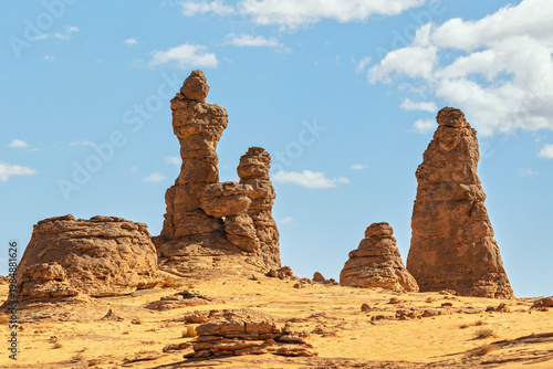Sandstone rocky columns or pillars formation in Saudi Arabia desert at Al Gharameel, bright sunny day