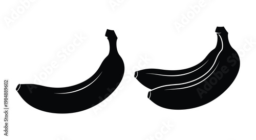Two bunches of bananas in a striking black silhouette on transparent background