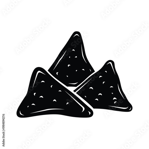 Black triangularshaped cookies with dimples on white background