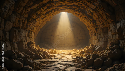 Empty tomb of Jesus Christ with glowing light inside a stone cave