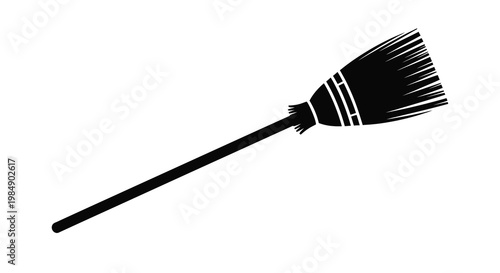 A simple black and white illustration of a traditional household broom