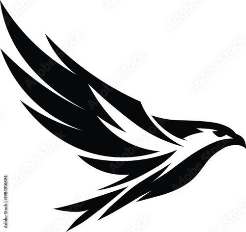 A striking black silhouette of an eagle in dynamic flight