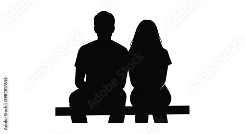 Silhouetted couple seated together facing away from the viewer