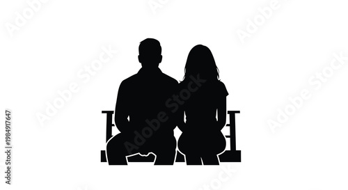 Silhouettes of a couple seated closely together on a bench