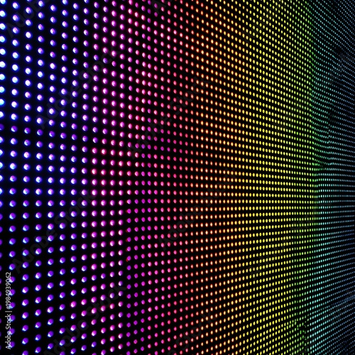 Colorful neon dot display creating futuristic screen texture photo