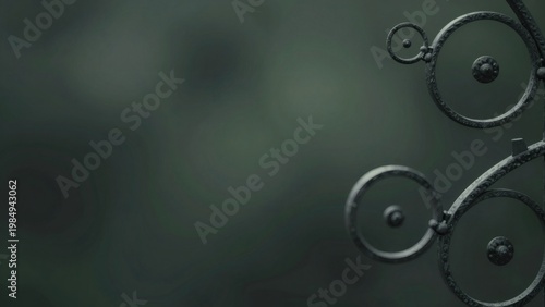 Moody Wrought Iron Scrolls on Dark Forest Green Background with Copy Space for Banner Template