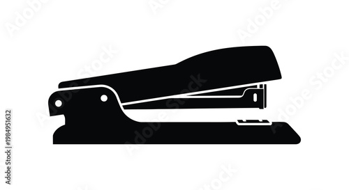 A stark black silhouette of a common office stapler simple and clean silhouette
