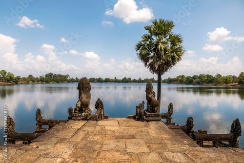 Scenic Landscape of Srah Srang Reservoir, Angkor Cambodia with with Clouds and Calm Water. Tropical Travel Destination
