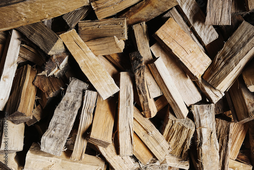 Photos Stack of chopped firewood pieces
