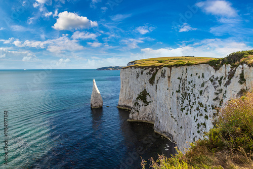 Old Harry Rocks White Chalk Cliffs at Jurassic Coast in Dorset, England, UK at Sunset
