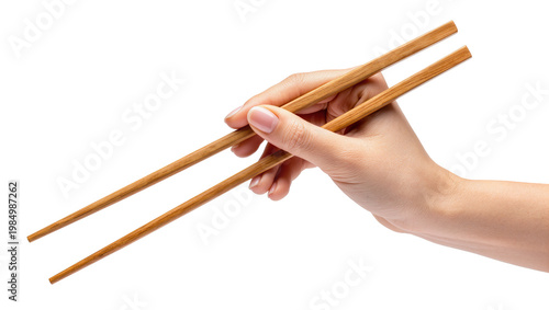 Foto Female hand holding wooden chopsticks, isolated on transparent background