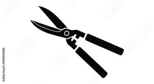Black pruning shears shown in a stark minimalist graphic silhouette