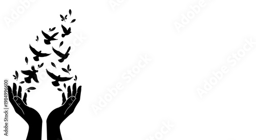Silhouette of hands releasing a flock of birds into the air.