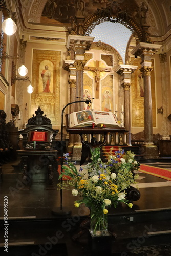 Detailed view of Haarlem church interior with pulpit and religious artworks.