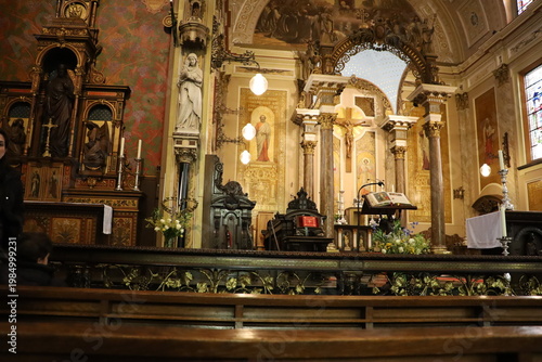 Historic church interior in Haarlem with altar and ornate decorations.