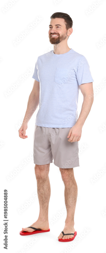 Fototapeta premium Handsome man in beachwear on white background