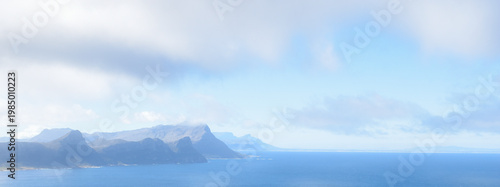 Obraz na plátně Minimal coastal landscape with mountains and blue sea, copy space