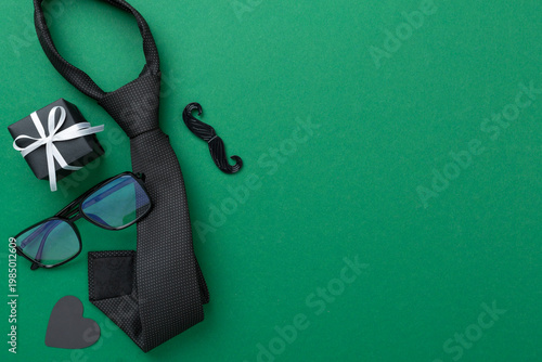 Happy Father's Day accessories on color background, top view