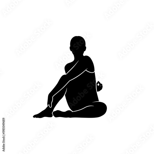 Silhouette of a person performing a seated spinal twist yoga pose, promoting flexibility and mindfulness