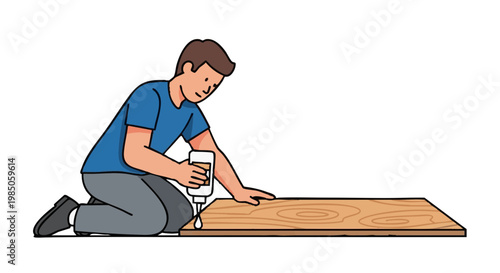 Carpenter gluing laminate plank during home renovation