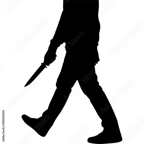 Silhouette of a person walking with a knife.