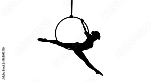 A woman performs an aerial hoop trick in a dramatic pose.