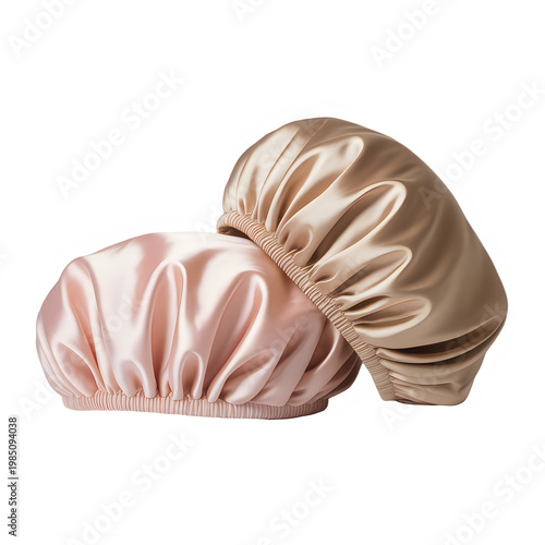 Two satin bonnets in pink and beige isolated on a transparent background hair bonnet
