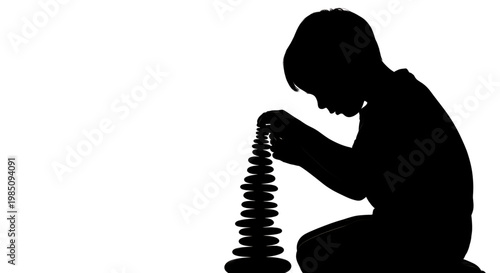 A silhouette of a person playing with a stack of discs in a contemplative pose