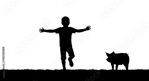 A silhouette of a happy child playing with a pig in a field