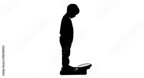 A silhouette of a boy standing on a scale against a white background