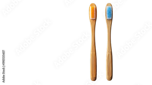 Two bamboo toothbrushes with colorful bristles on transparent background