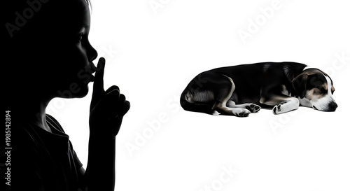 A silhouette of a child gesturing for silence with a dog lying down beside them.
