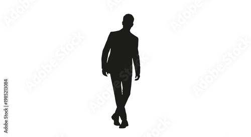 Silhouette of a Man Walking Alone.