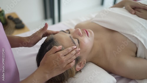The pretty woman is relaxing at hotel 's massage  and spa. Lifestyle, leisure activity.
