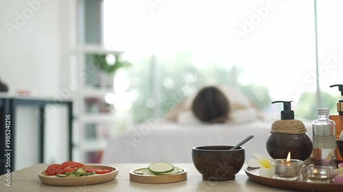 The pretty woman is relaxing at hotel 's massage  and spa. Lifestyle, leisure activity.