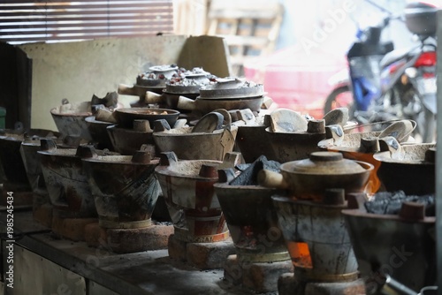 Photography Traditional Charcoal Clay Pot Stoves Stacked in a Kuala Lumpur Restaurant Kitche