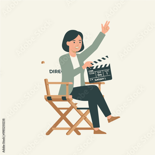 Woman Director Sitting on Chair Holding Clapperboard 1.