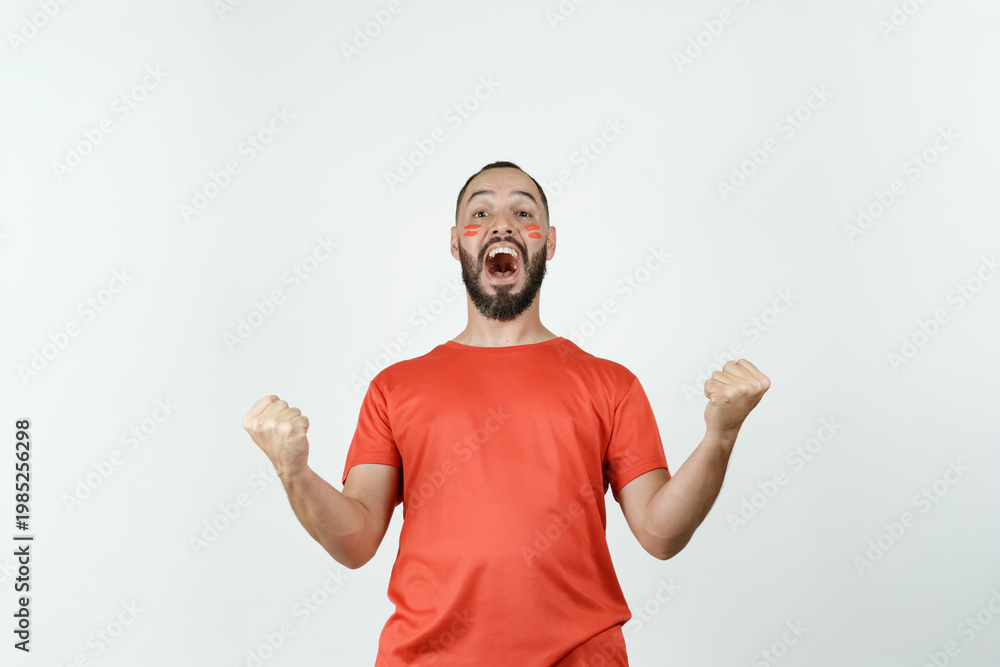 Naklejka premium Soccer fan cheering for victory with enthusiasm
