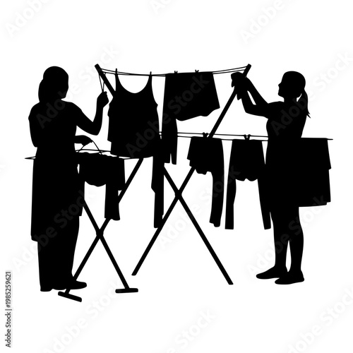 Two Women Hanging Laundry on a Drying Rack Silhouette