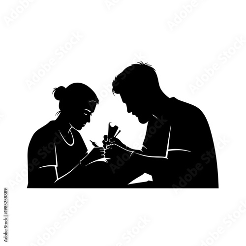 Silhouette of a man and woman working together on a tattoo or craft