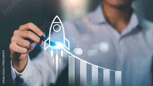 A person draws a rocket launching upward alongside a rising bar chart, symbolizing startup growth, business acceleration, performance metrics, innovation strategy, exponential success driven by data