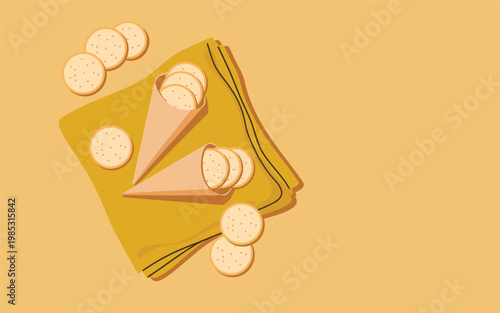 A delicious arrangement of cheese slices and crackers on a yellow napkin.