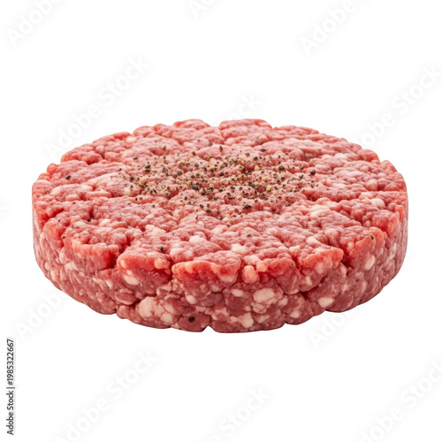 Raw ground beef patty seasoned with pepper