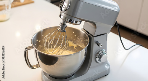 Kitchen appliance used for mixing ingredients for baking, making dough, and whipping cream