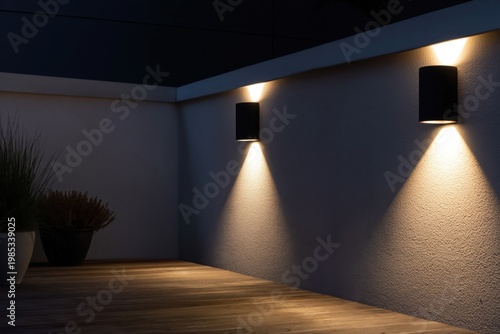 Wall lamps cast a warm and inviting glow across the textured surface of an exterior wall, highlighting the architectural details of a contemporary patio space at night.